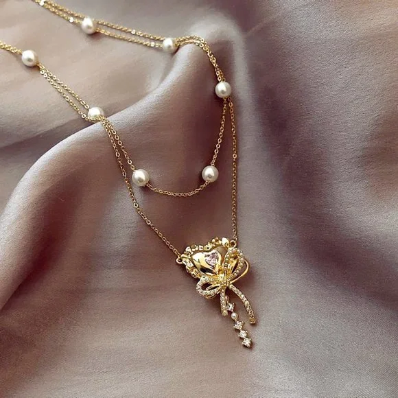 GOLICC Pearl Bow Necklace - Picture 2 of 8